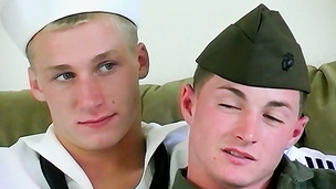 Gay dudes in uniforms kiss then stroke those beef bayonets